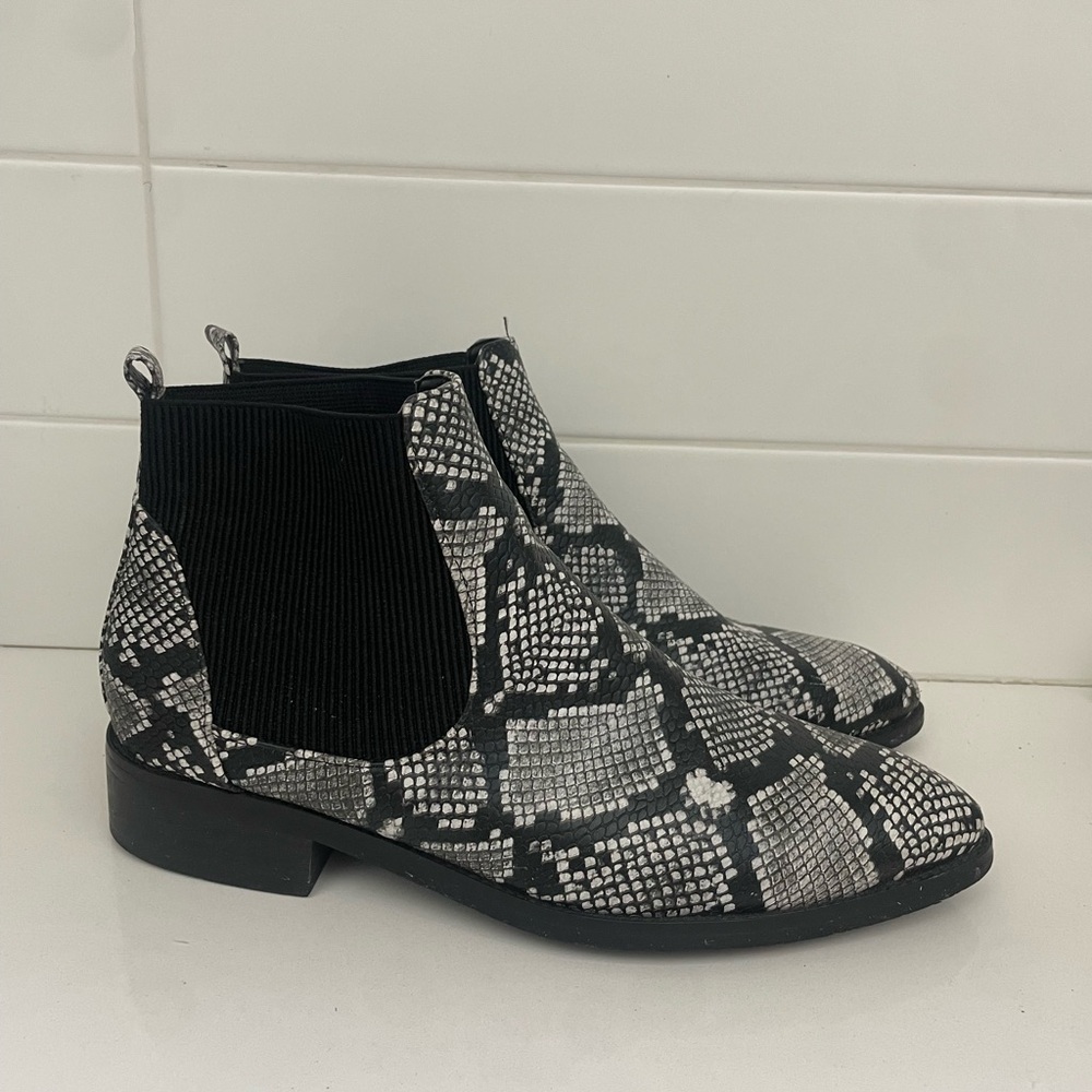 Women’s snakeskin print boots